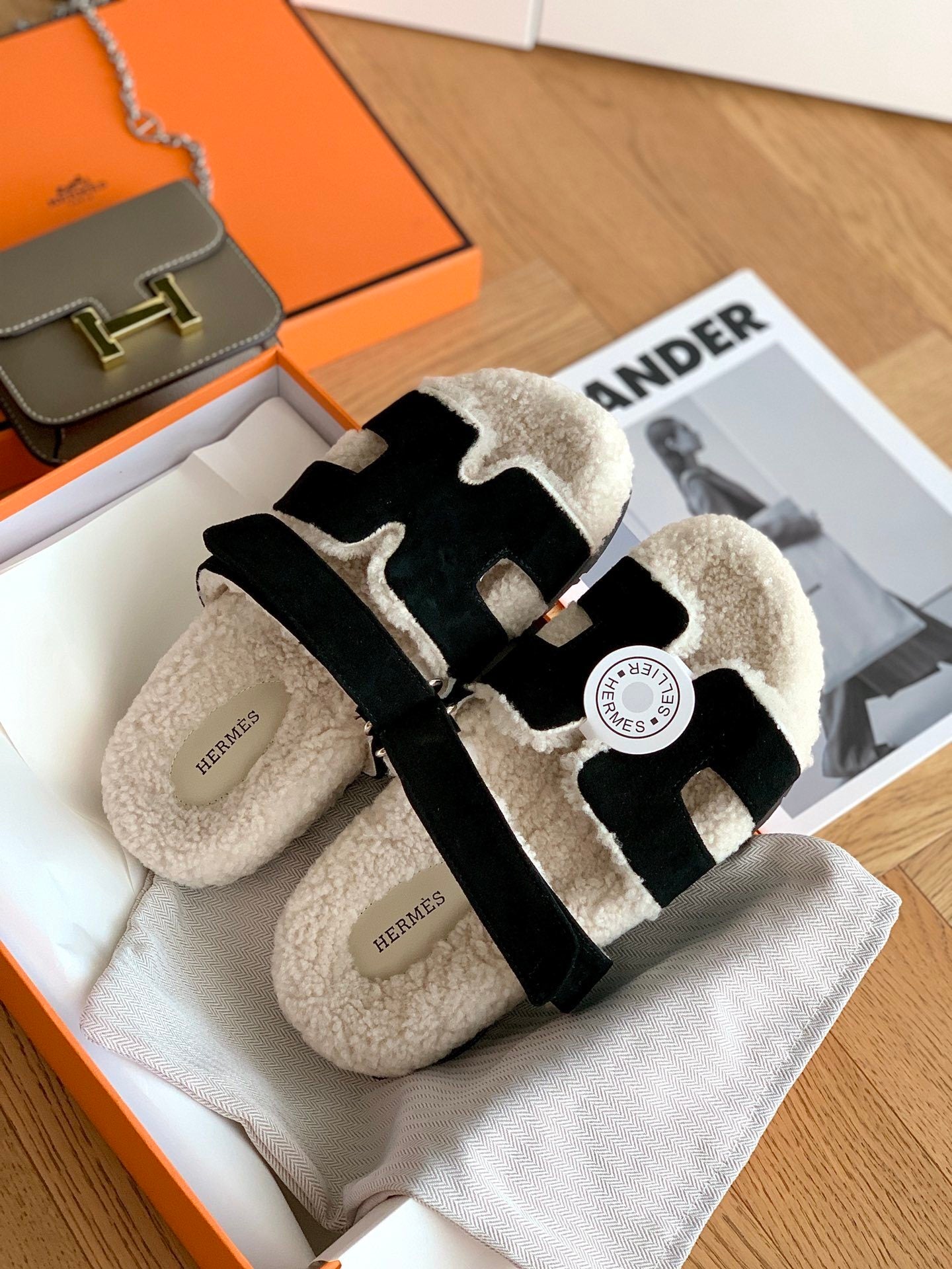 SHEARLING SLIDE SANDALS WITH BLACK STRAPS