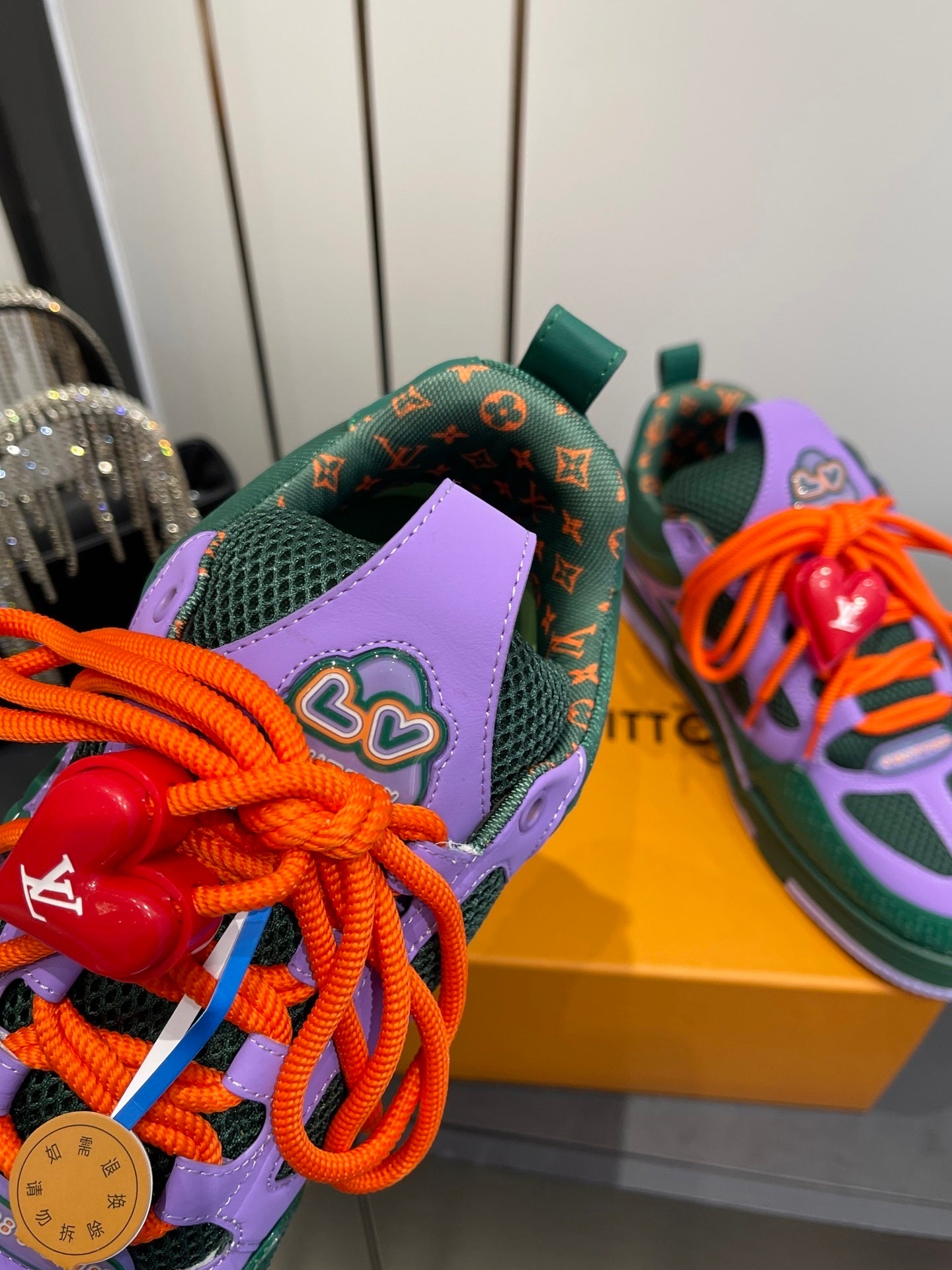 BOLD COLORBLOCK SNEAKERS WITH OVERSIZED LACES AND CHARM DETAIL