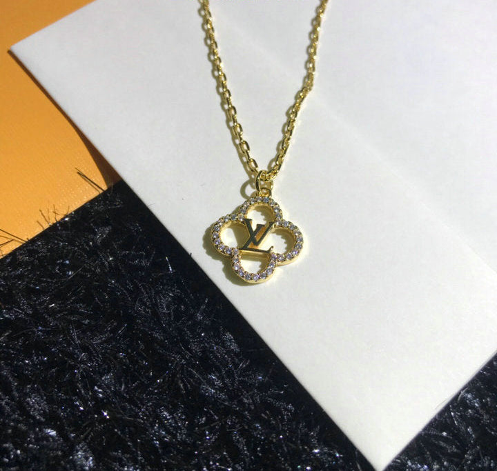 GOLD-TONE CRYSTAL CLOVER PENDANT NECKLACE