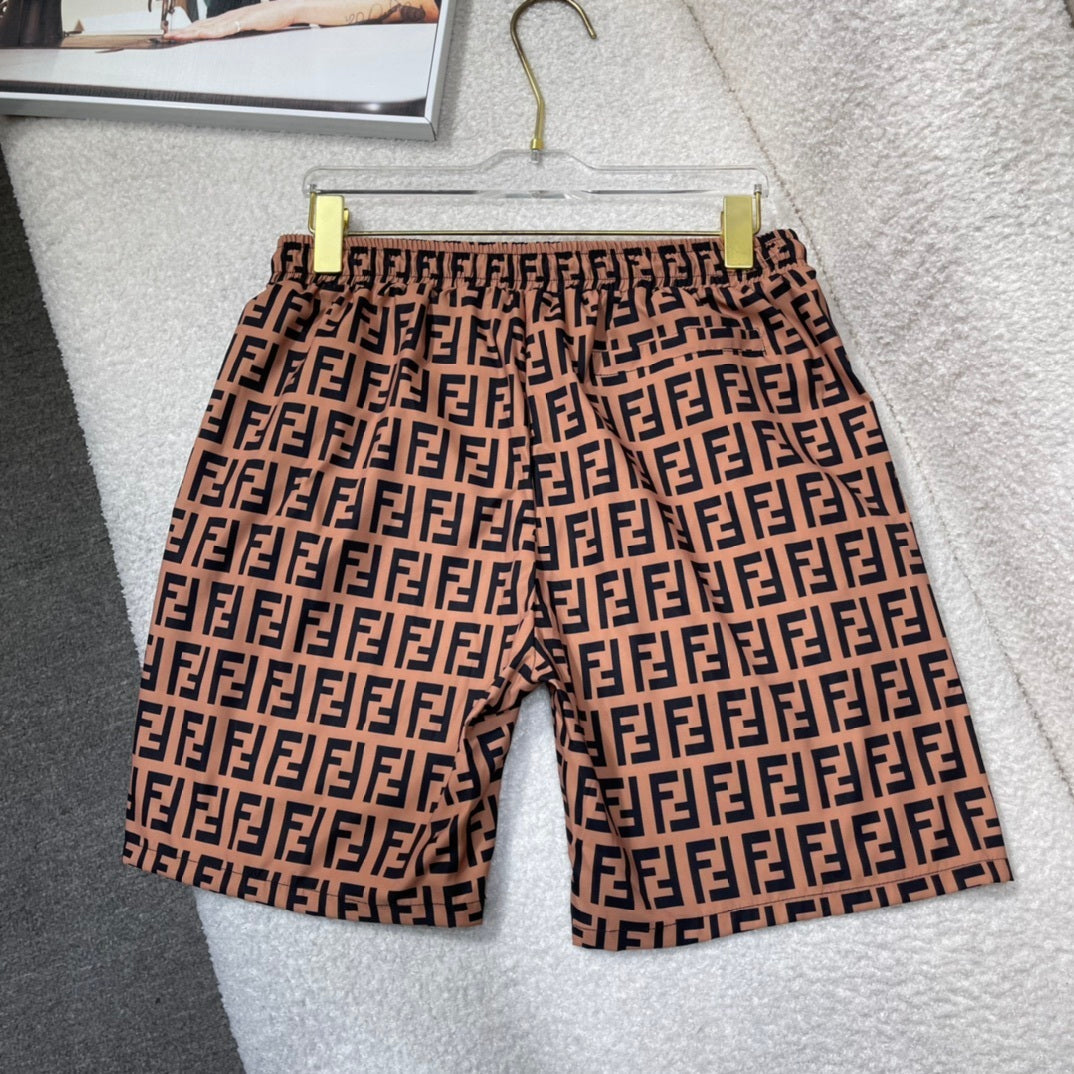 MONOGRAM SWIM SHORTS – BROWN
