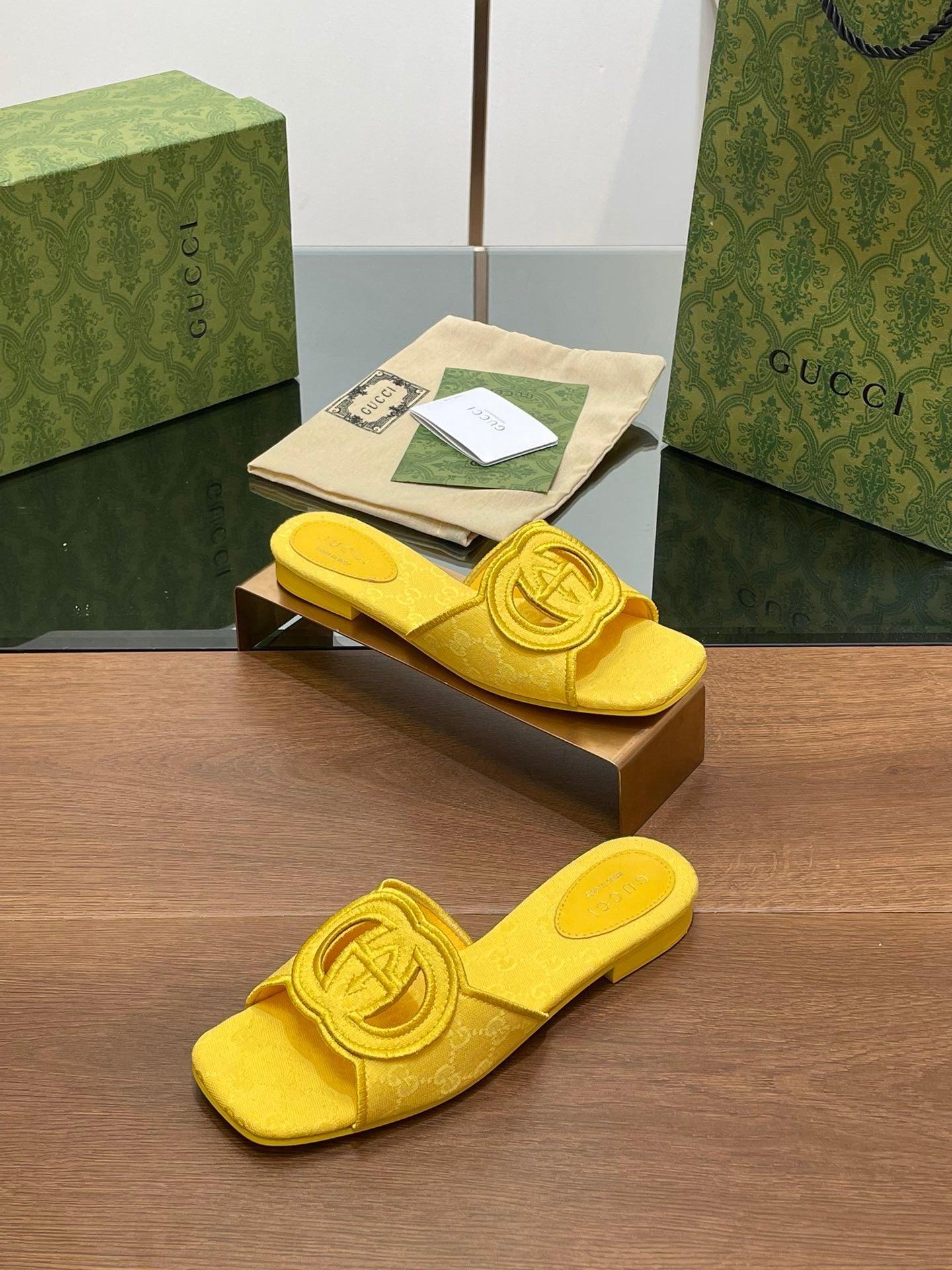 YELLOW EMBOSSED LOGO SLIDES