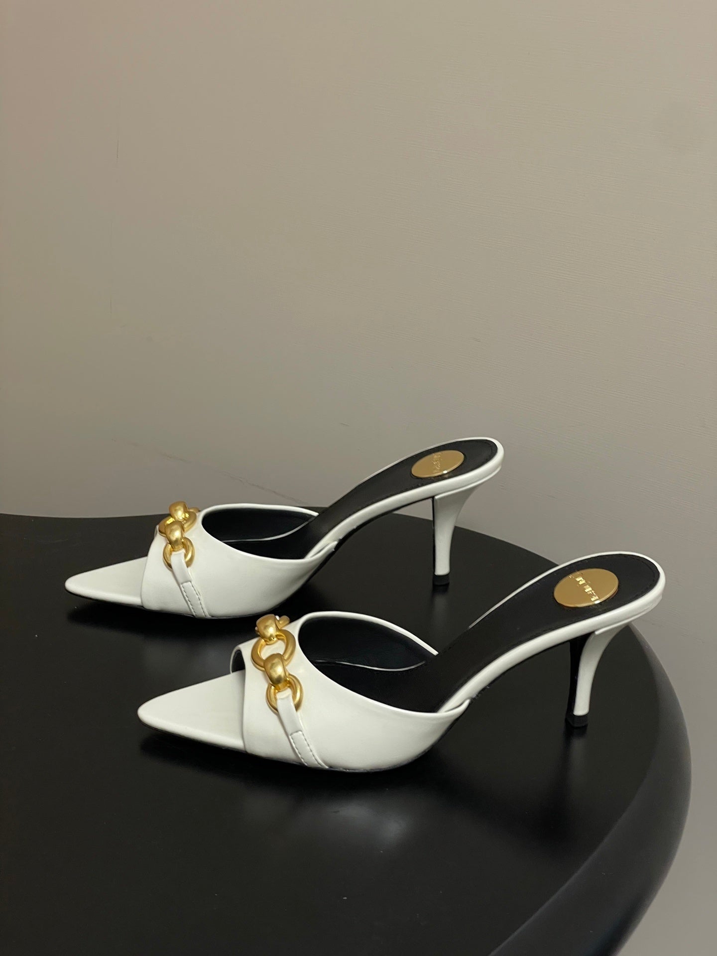 WHITE POINTED TOE MULE HEELS WITH GOLD DETAIL