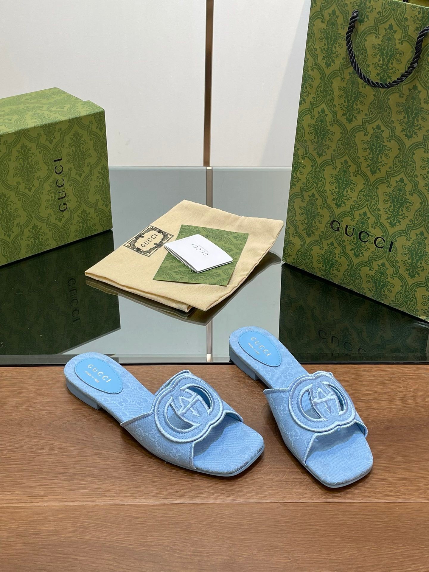 BLUE EMBOSSED LOGO SLIDES