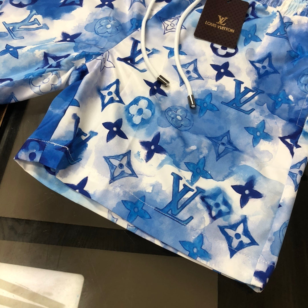 MONOGRAM SWIM SHORTS – BLUE TIE-DYE