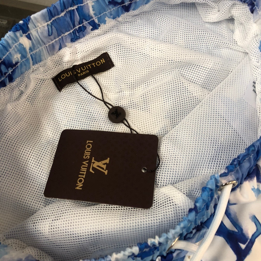 MONOGRAM SWIM SHORTS – BLUE TIE-DYE