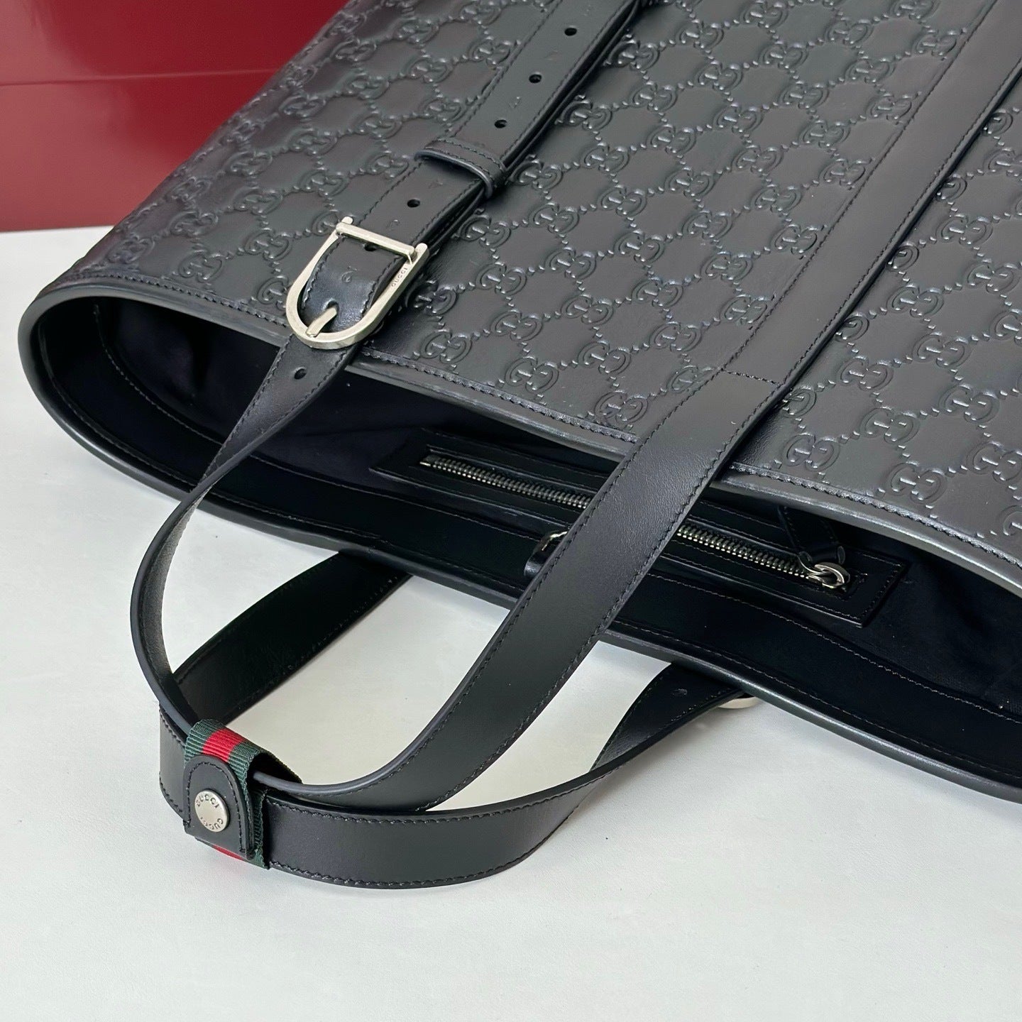 EMBOSSED LEATHER TOTE BAG