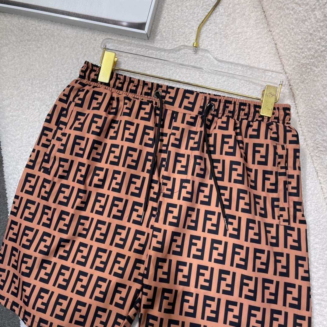 MONOGRAM SWIM SHORTS – BROWN
