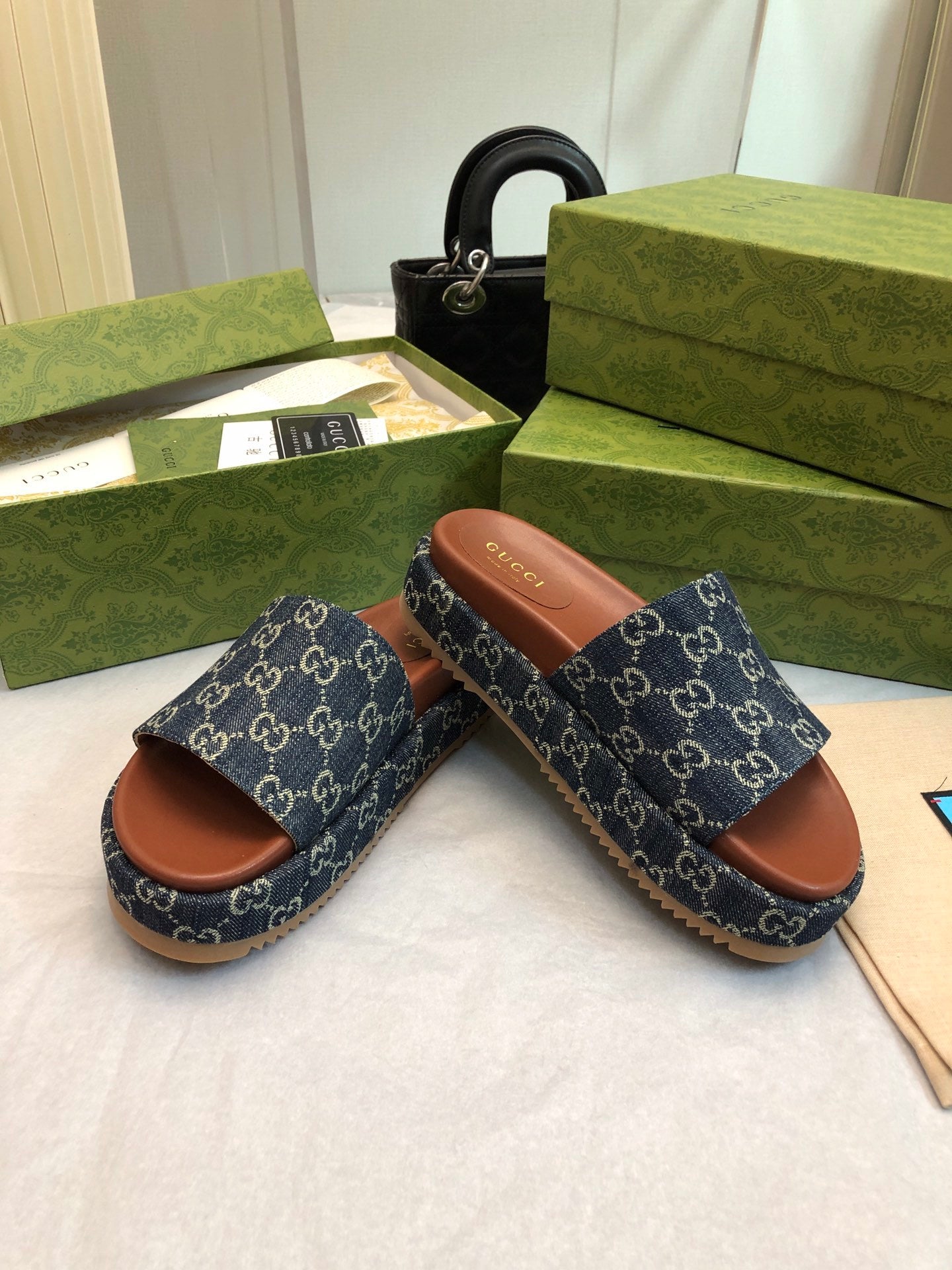 DENIM MONOGRAM PLATFORM SLIDES