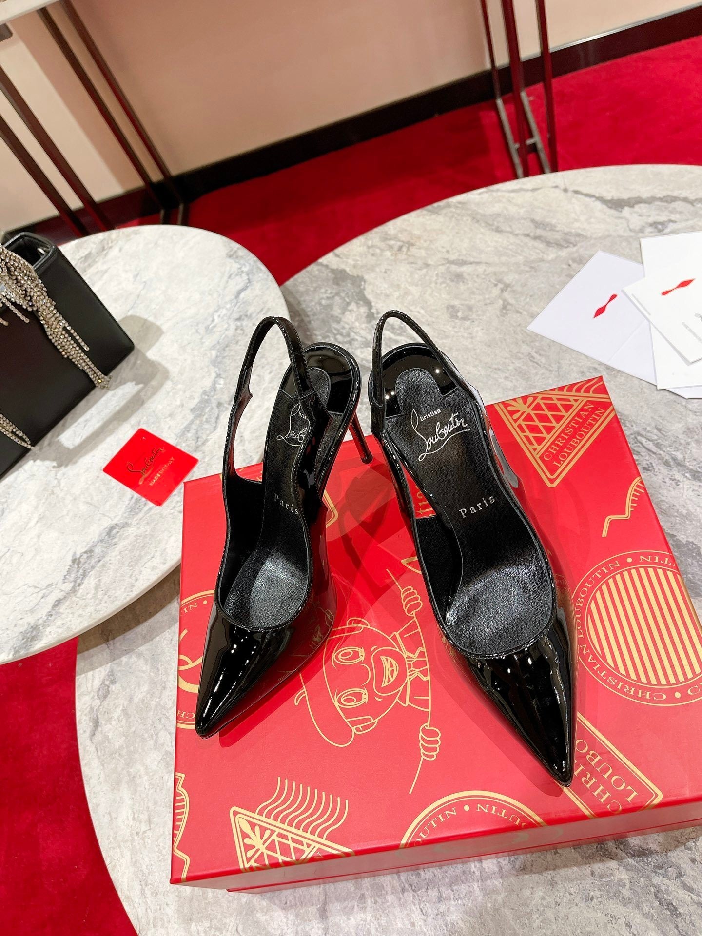 BLACK PATENT SCALLOPED SLINGBACK HEELS