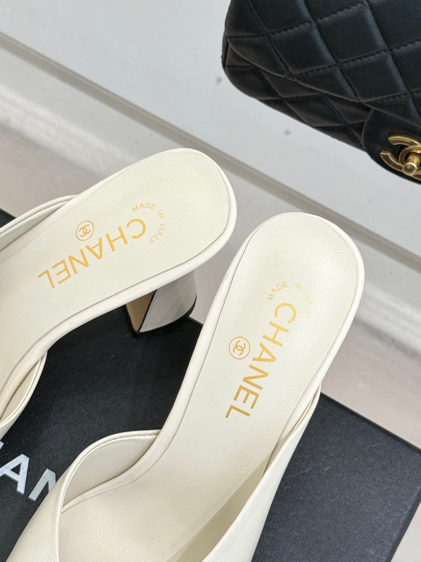 IVORY & BLACK TWO-TONE CAP-TOE MULE HEELS