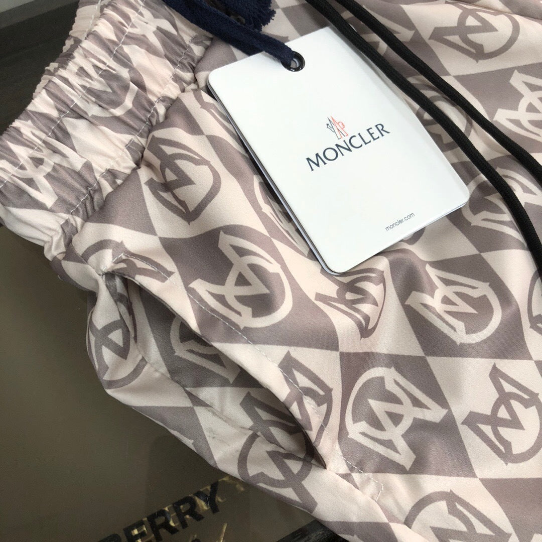 MONOGRAM PRINT SWIM SHORTS