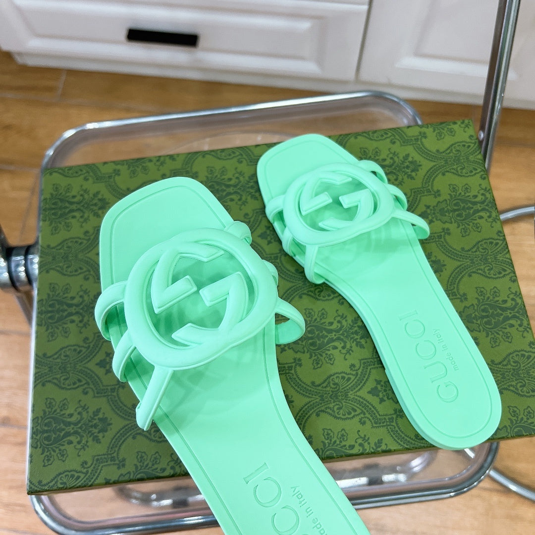 MINT GREEN RUBBER SLIDE SANDALS WITH ROUND EMBLEM