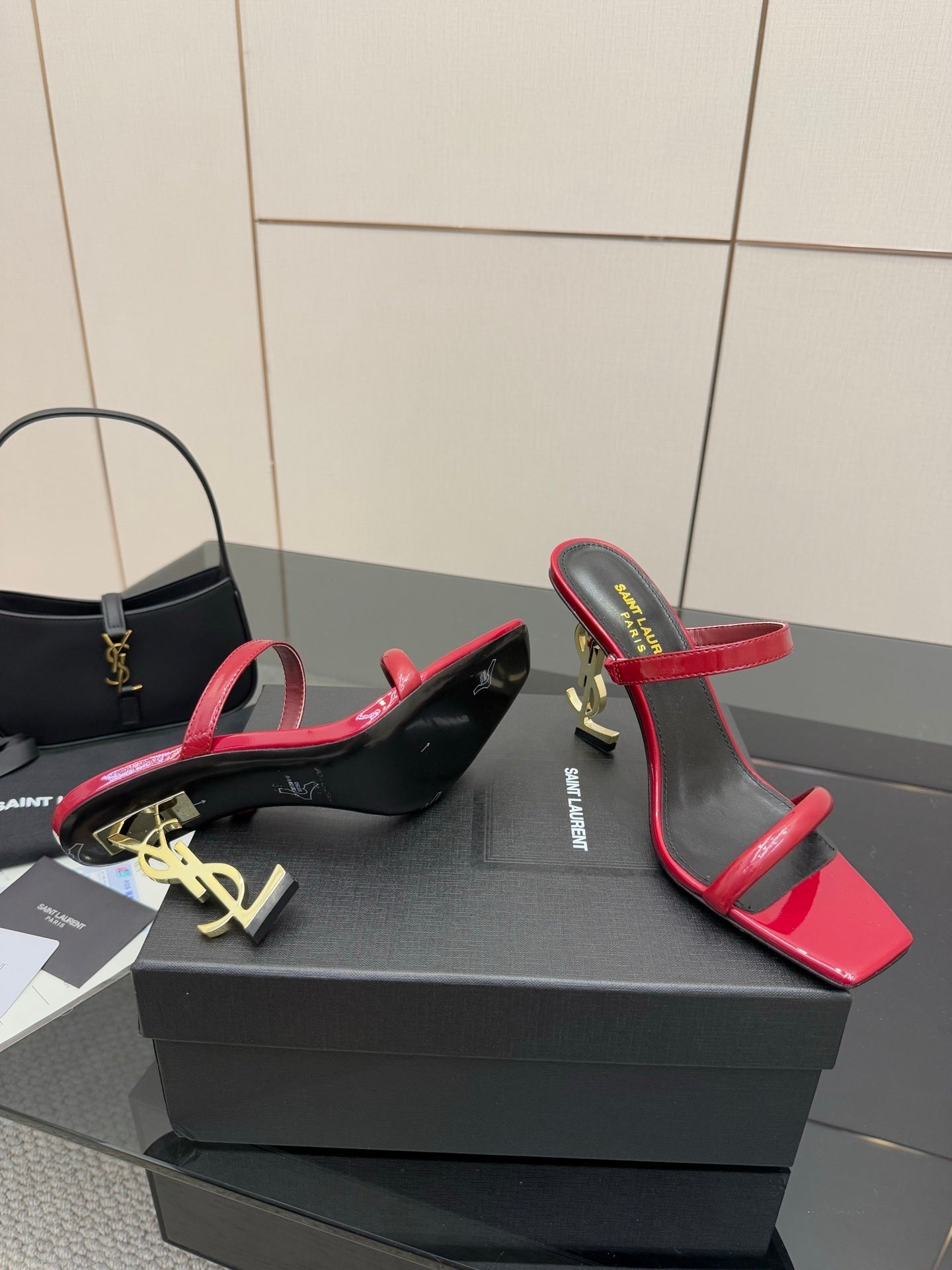 GLOSSY RED STRAPPY HEELS WITH GOLD LOGO HEEL