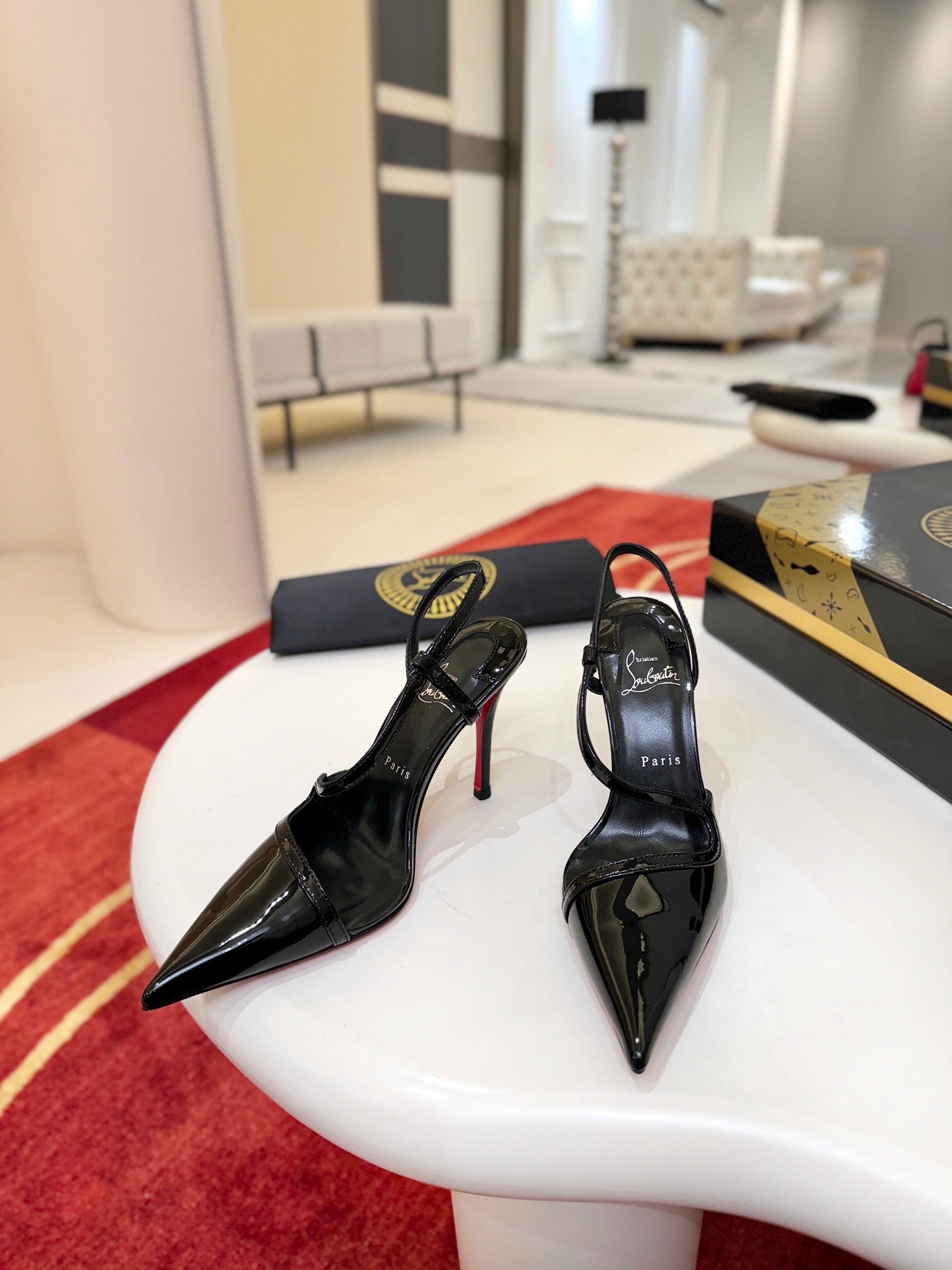 BLACK PATENT STRAPPY POINTED HEELS