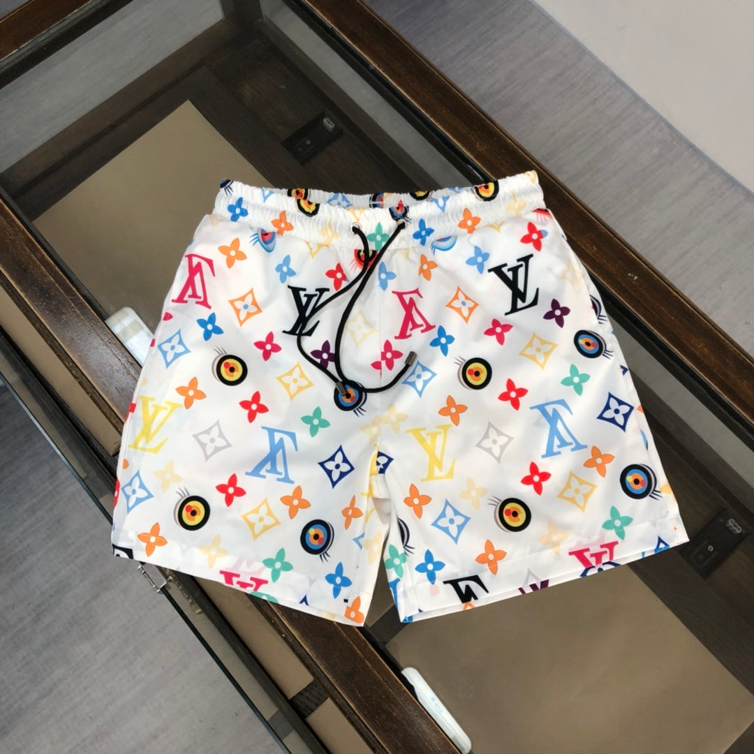 WHITE MULTICOLOR PRINT SWIM SHORTS