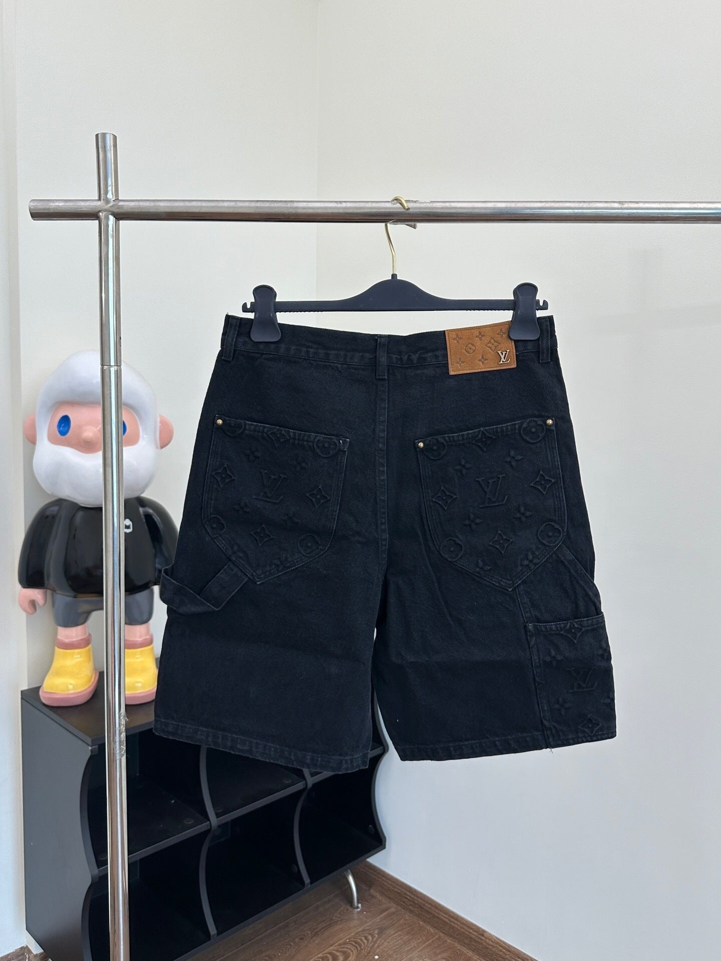 MONOGRAM EMBOSSED DENIM SHORTS