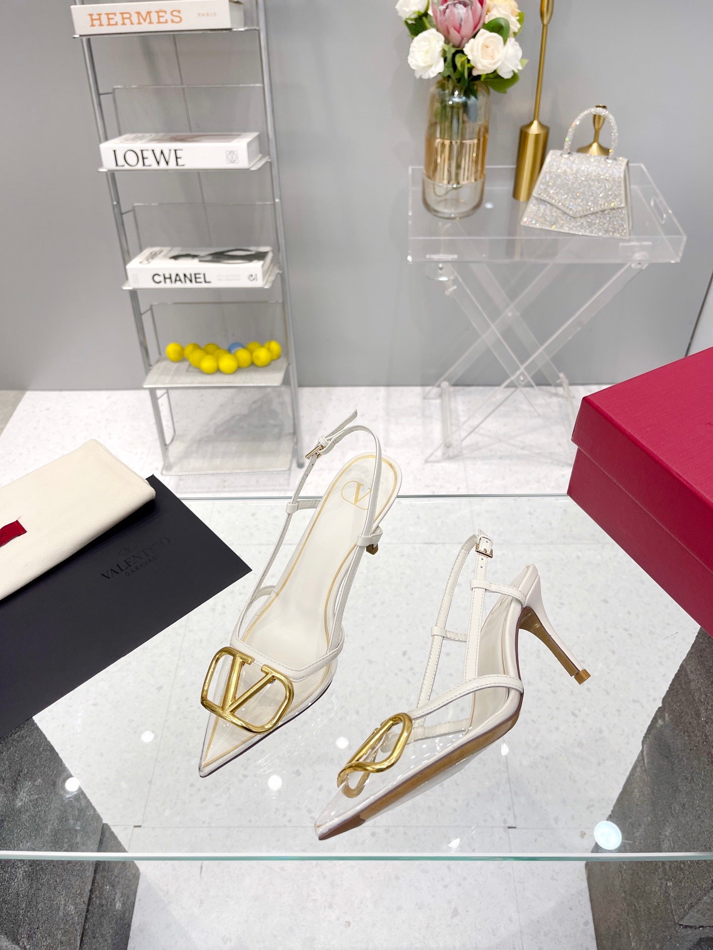 CLEAR SLINGBACK HEELS – ELEGANT WHITE WITH GOLD LOGO DETAIL