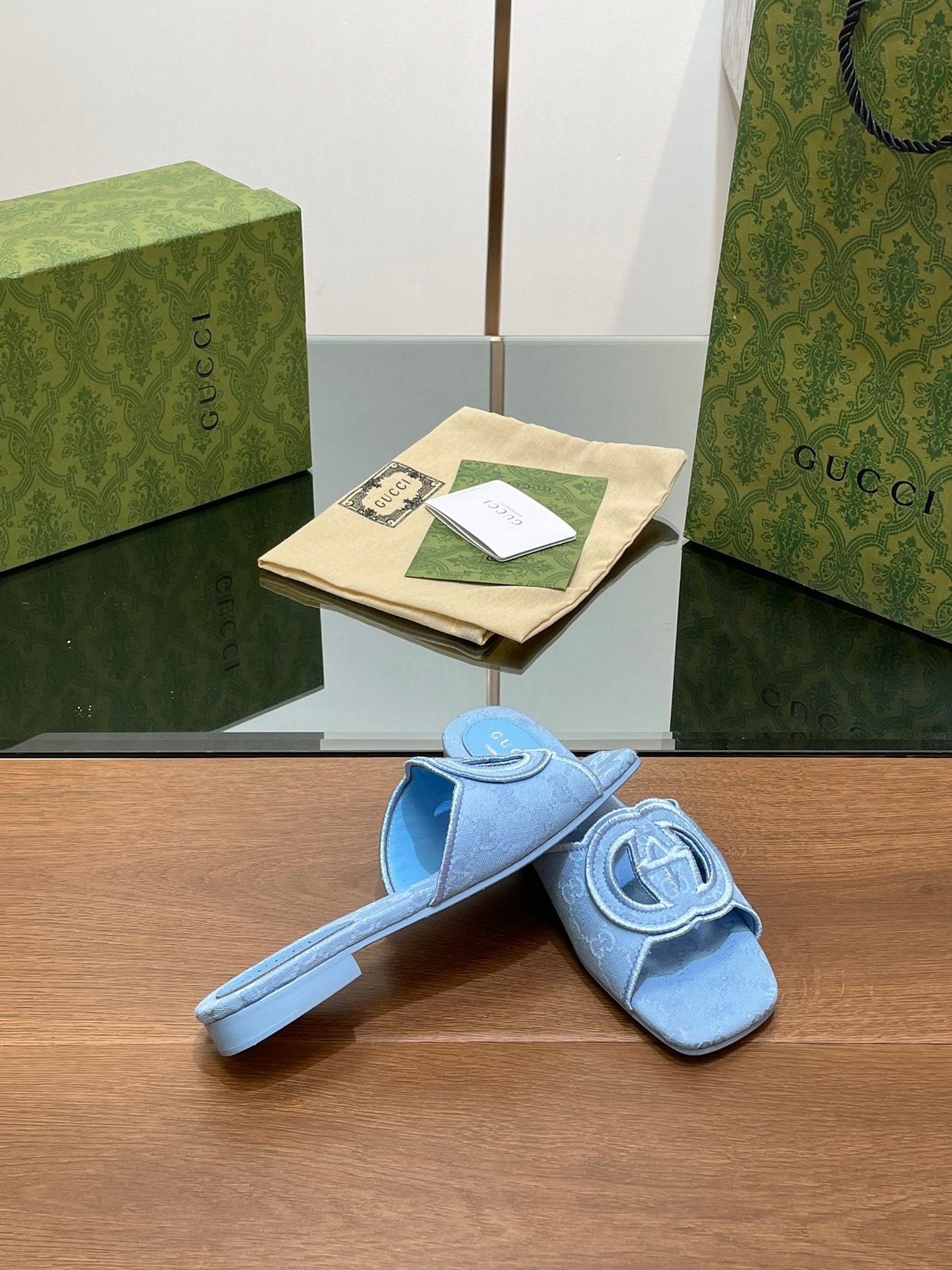 BLUE EMBOSSED LOGO SLIDES