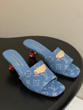 DENIM MONOGRAM MURAKAMI MULES WITH SCULPTED HEEL