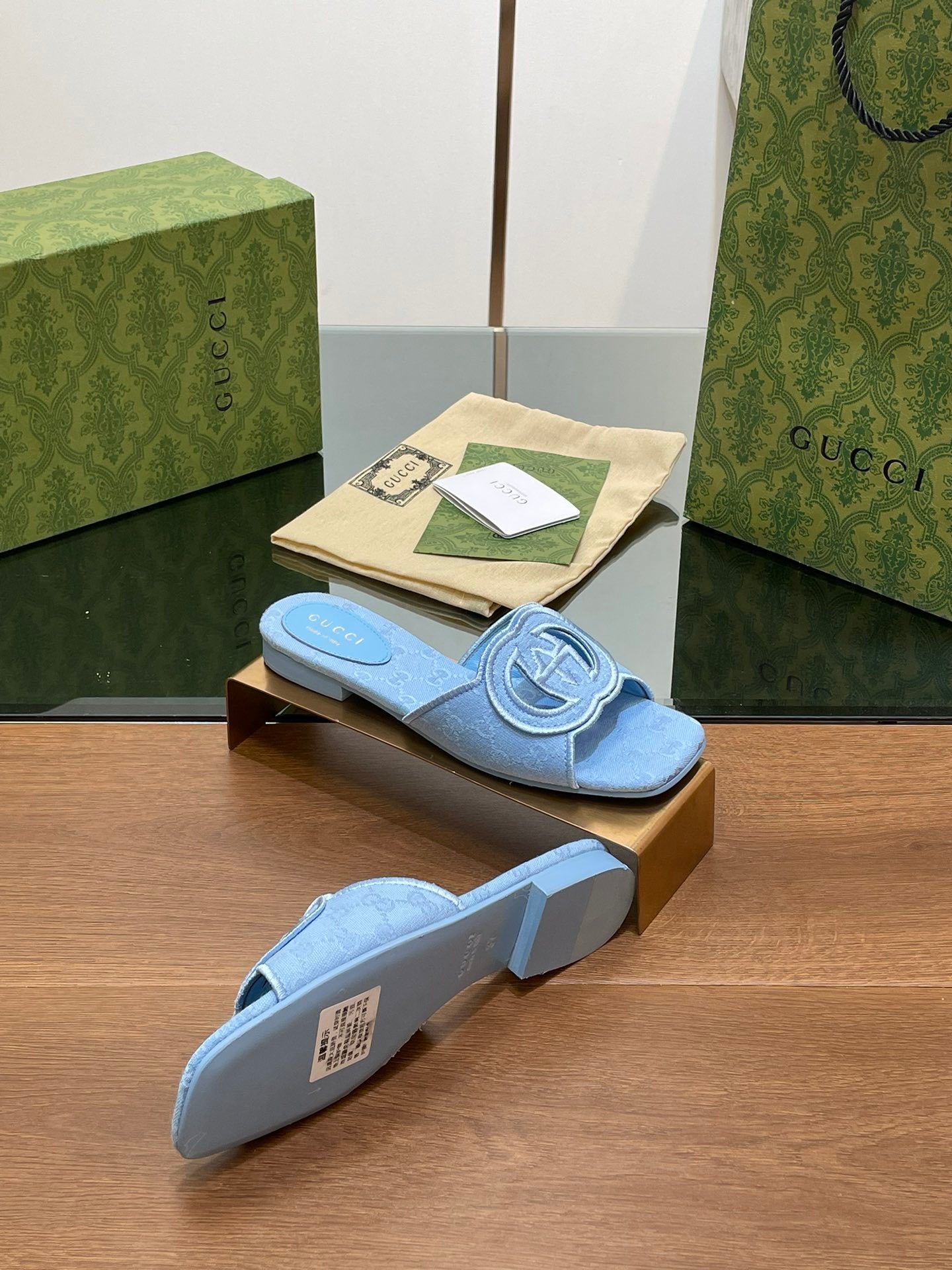 BLUE EMBOSSED LOGO SLIDES