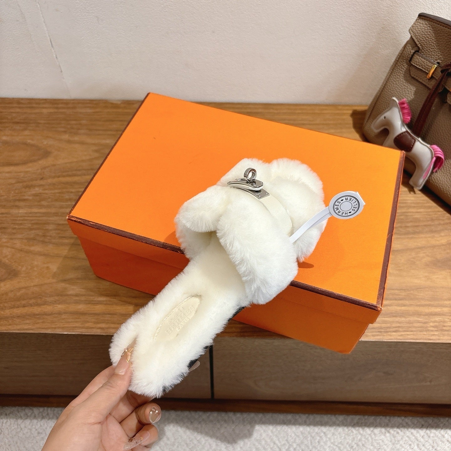 IVORY FAUX FUR MULE SLIPPERS WITH SILVER-TONE ACCENT