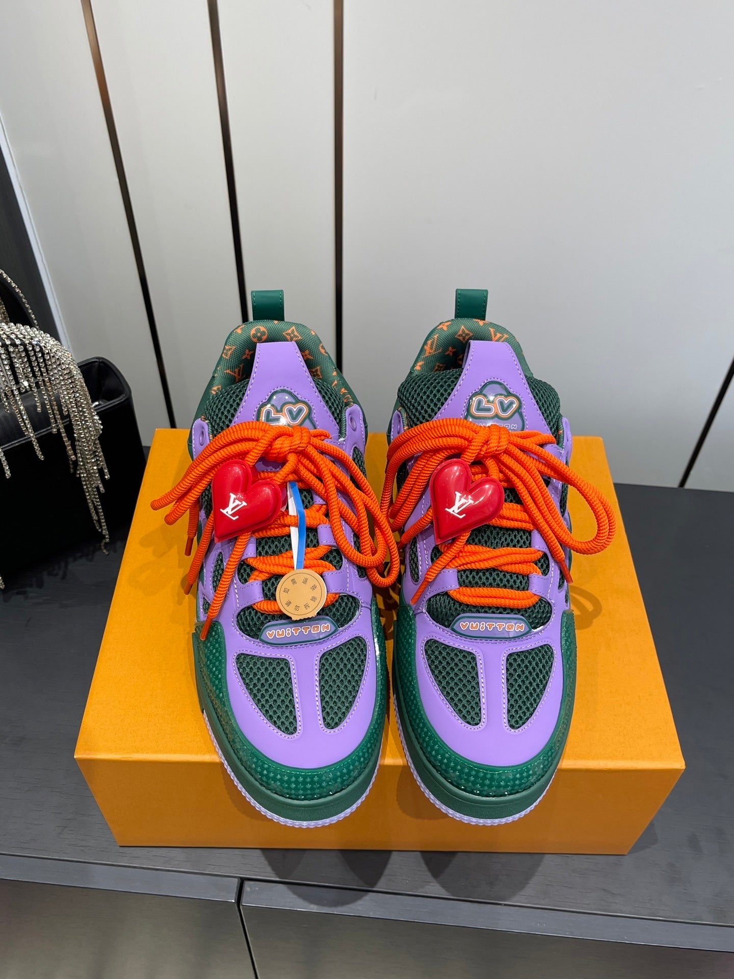 BOLD COLORBLOCK SNEAKERS WITH OVERSIZED LACES AND CHARM DETAIL