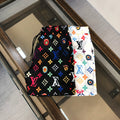 WHITE MULTICOLOR PRINT SWIM SHORTS