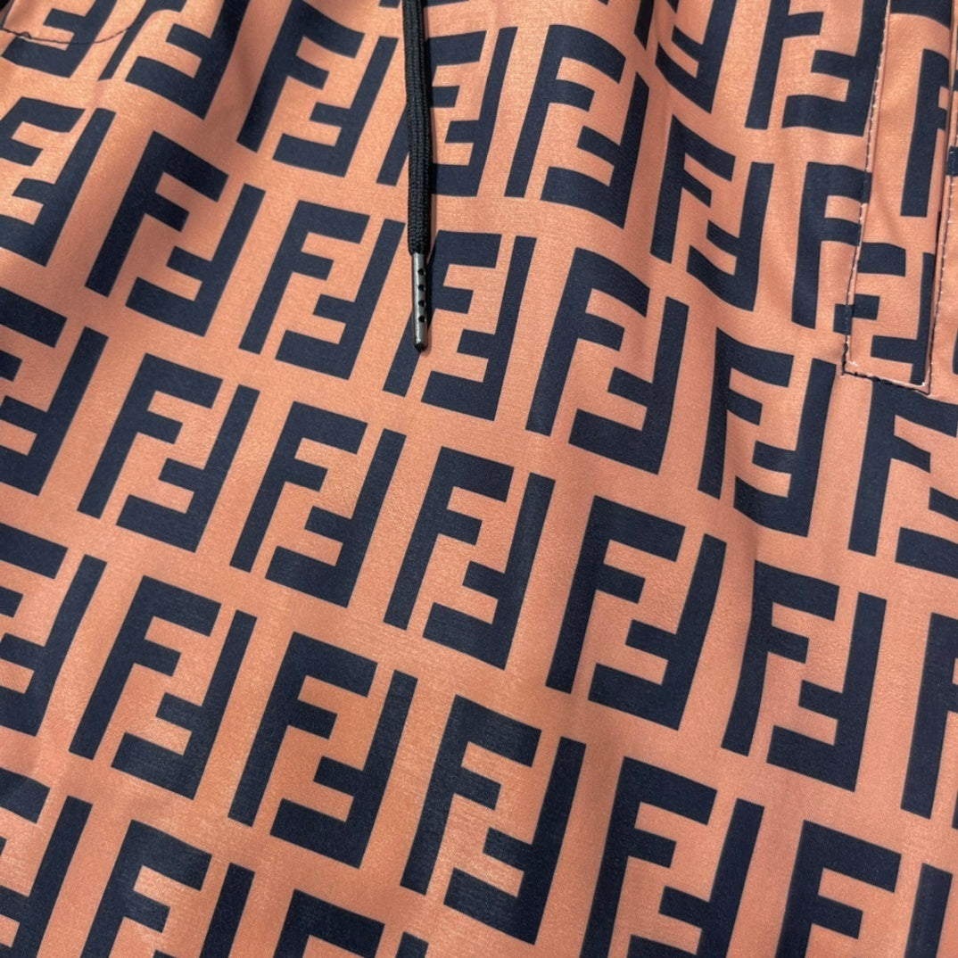 MONOGRAM SWIM SHORTS – BROWN