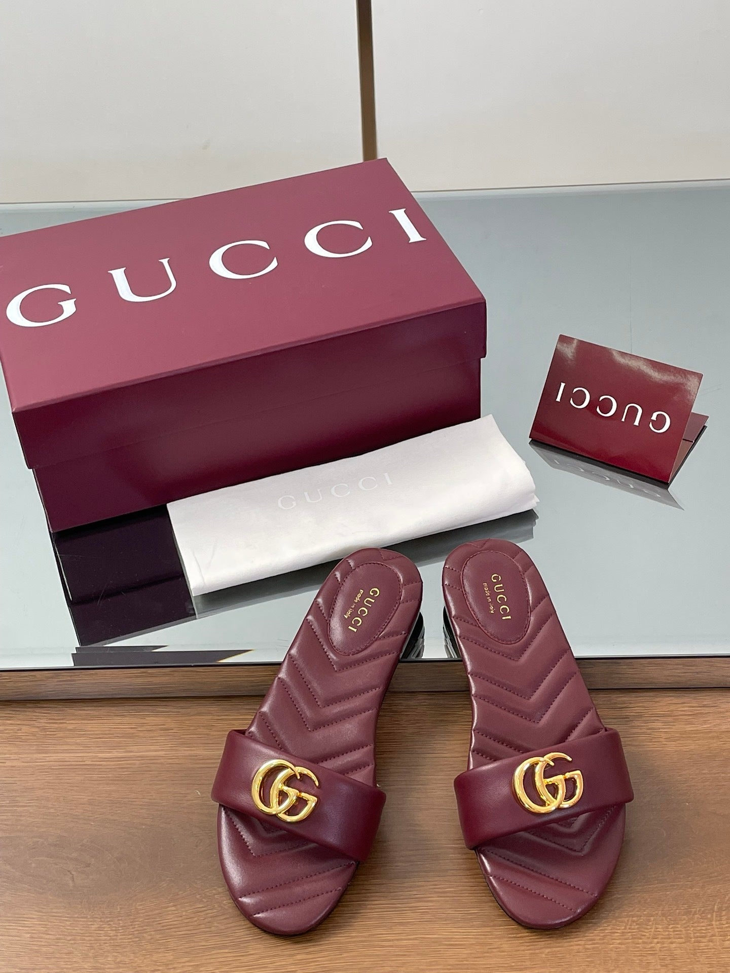 BURGUNDY QUILTED SLIDE SANDALS