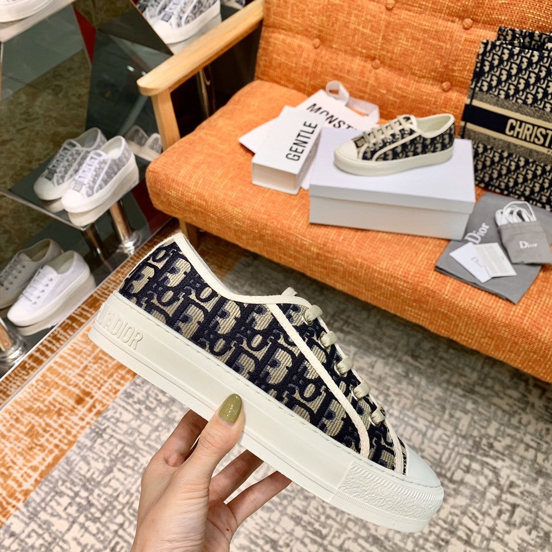 OBLIQUE MONOGRAM LOW-TOP CANVAS SNEAKERS