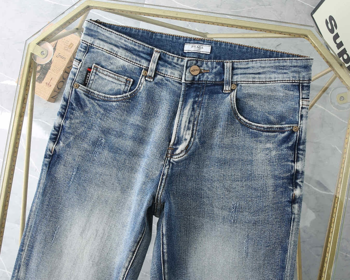 LIGHT WASH EMBROIDERED LOGO DENIM JEANS