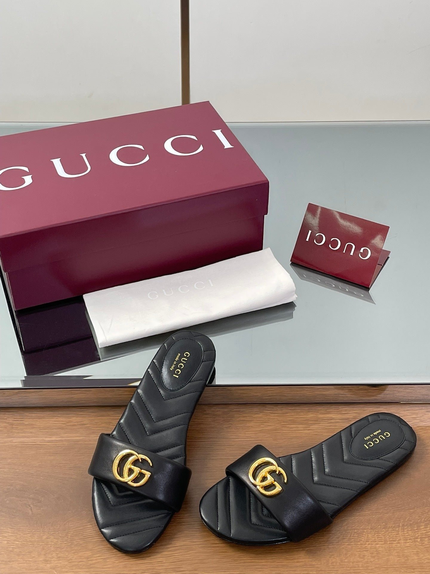 BLACK QUILTED SLIDE SANDALS