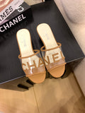 CLEAR LOGO STRAP FLAT SLIDES – TAN
