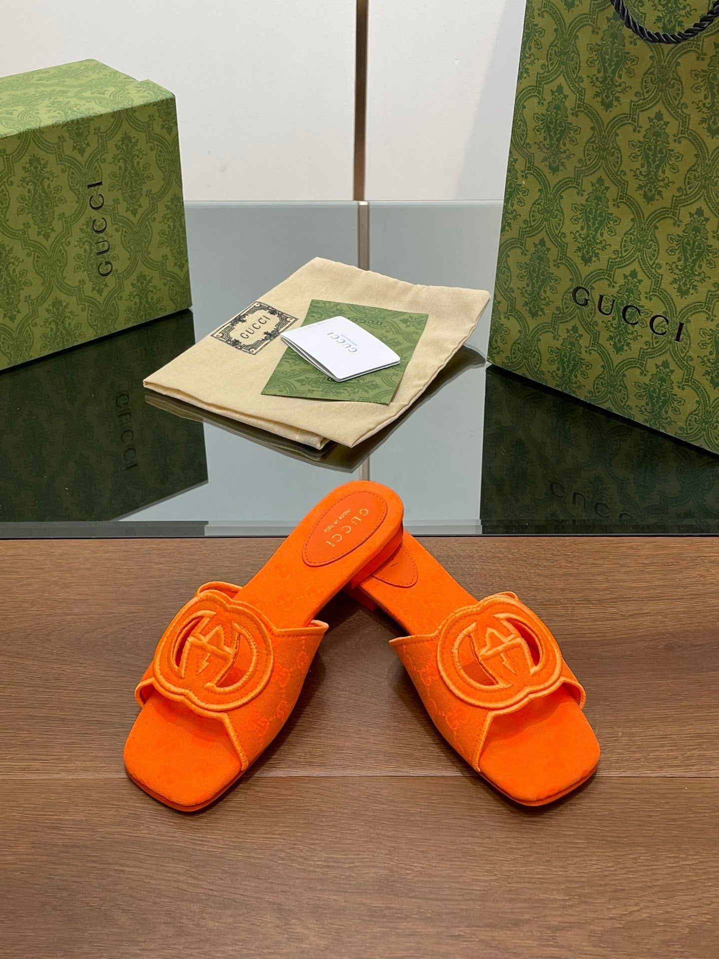 ORANGE EMBOSSED LOGO SLIDES
