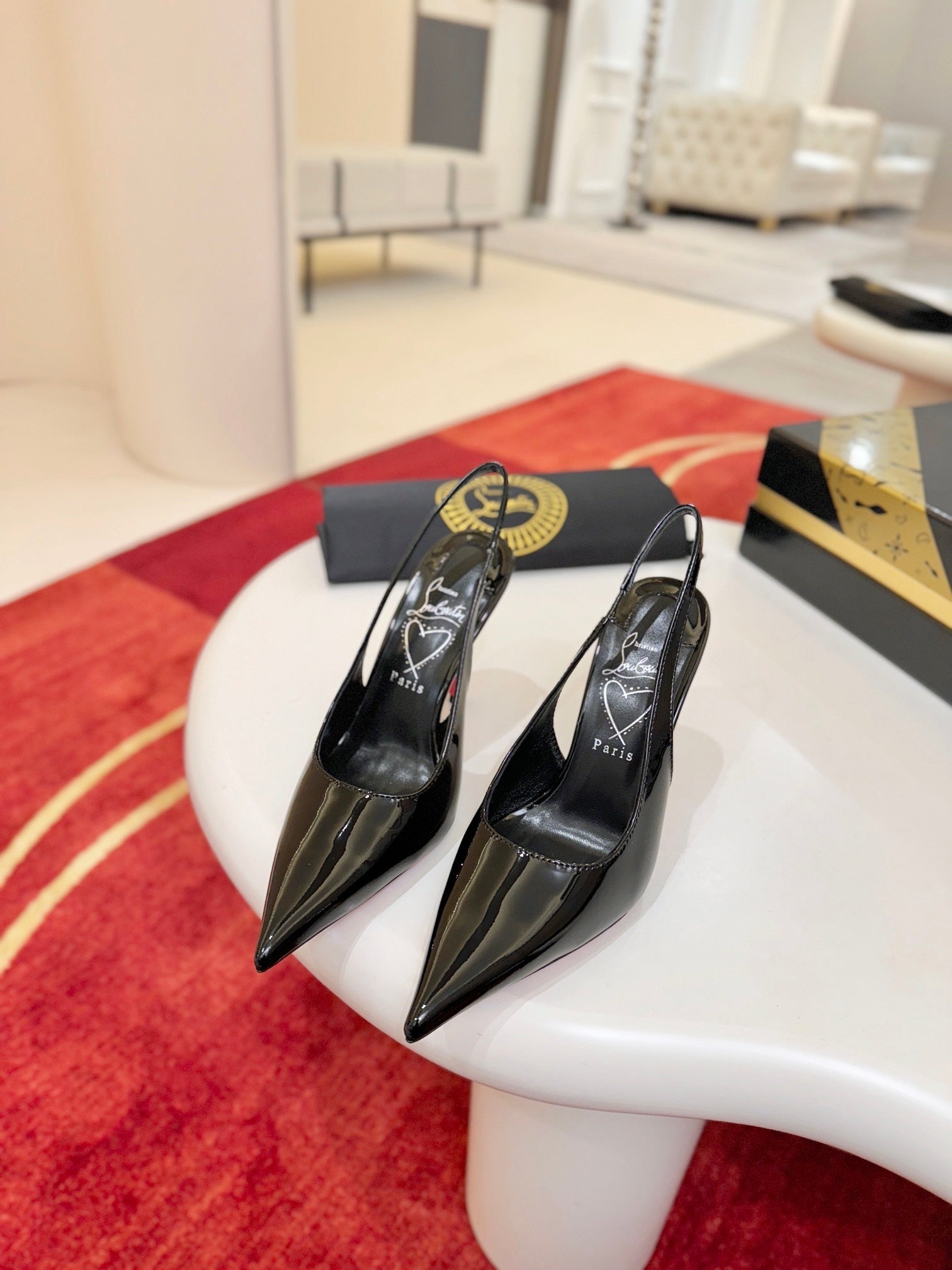 BLACK PATENT SLINGBACK POINTED HEELS