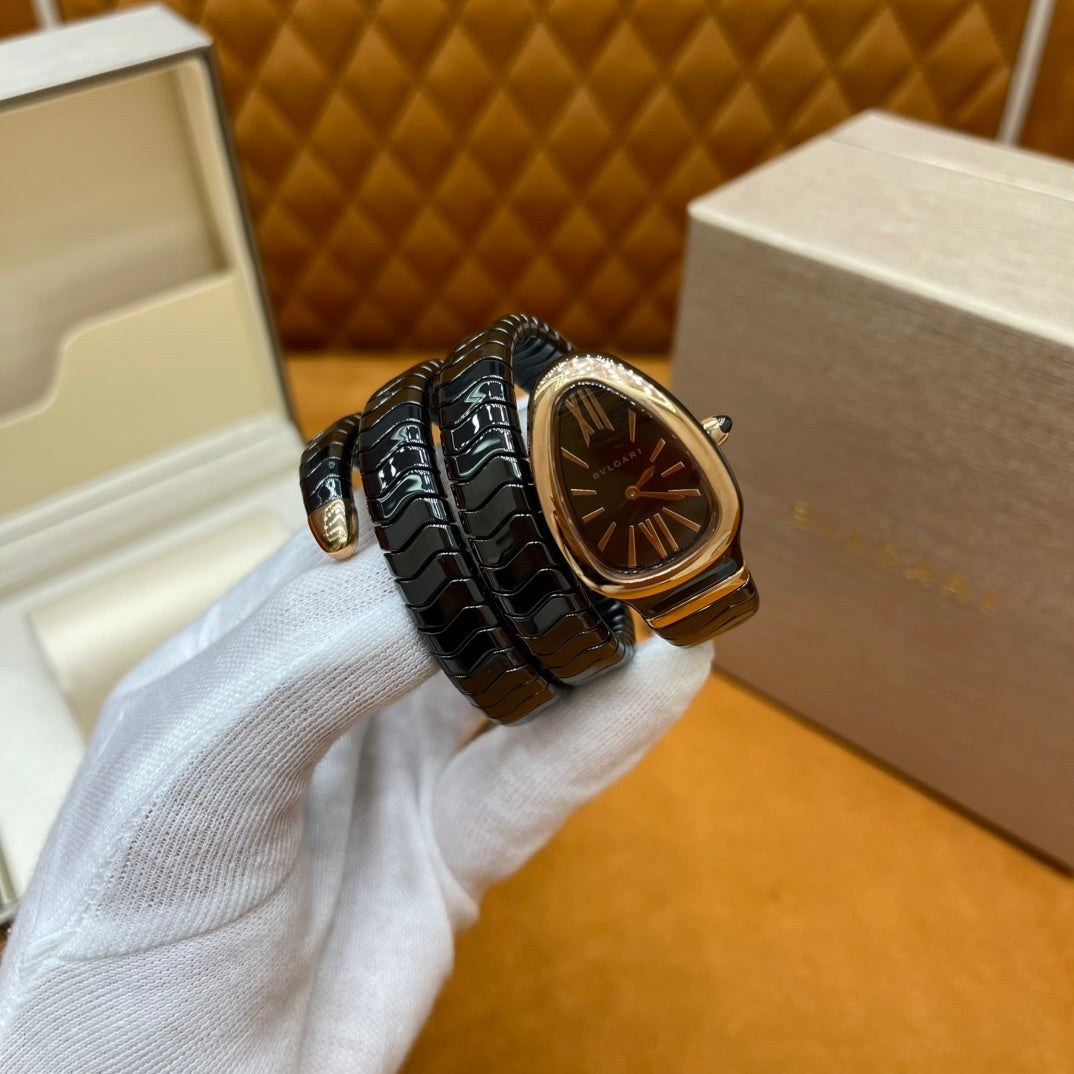 SERPENT WRAP WATCH – BLACK & GOLD ELEGANCE
