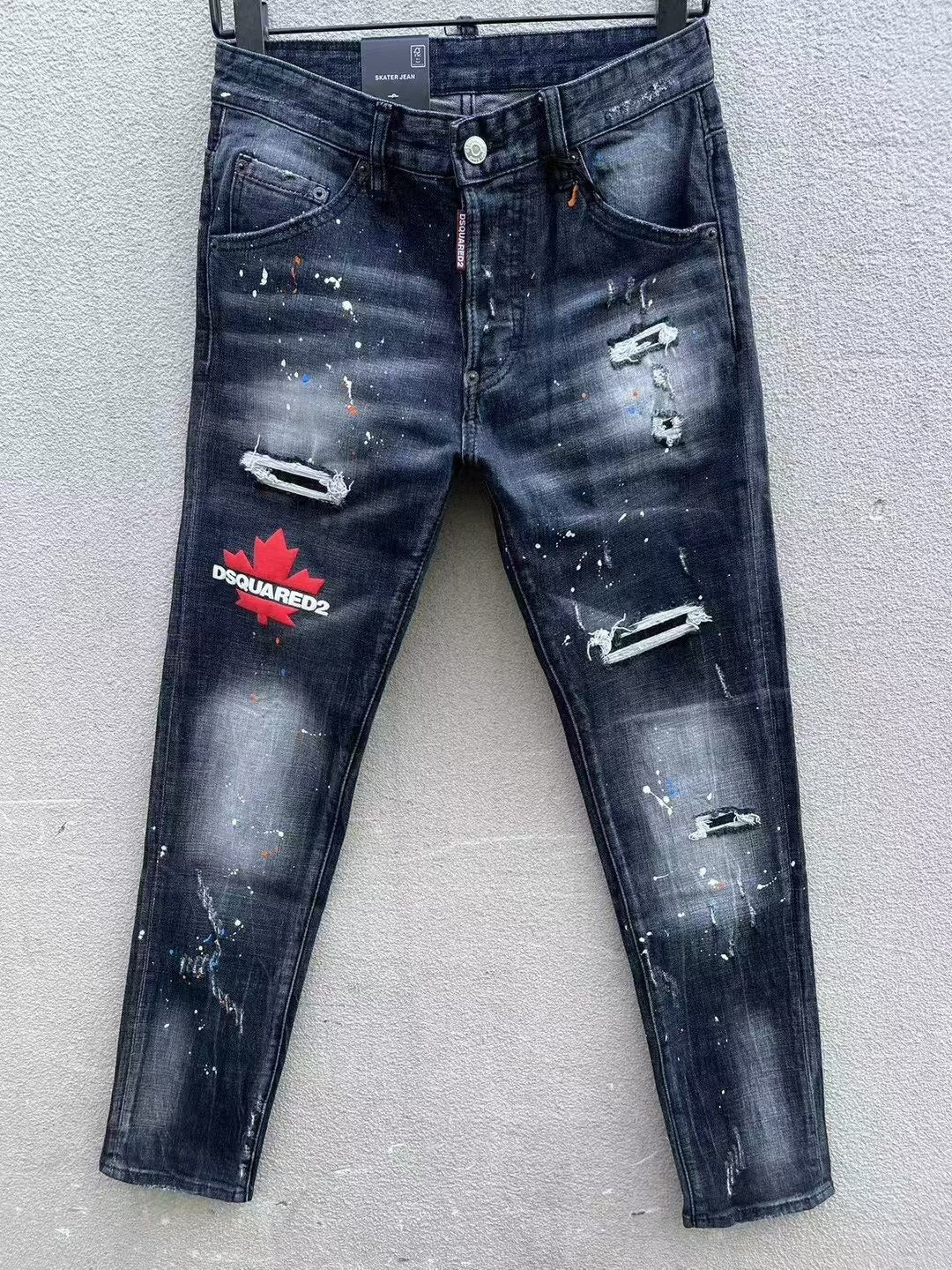 DISTRESSED PAINT SPLATTER SLIM JEANS WITH MAPLE GRAPHIC