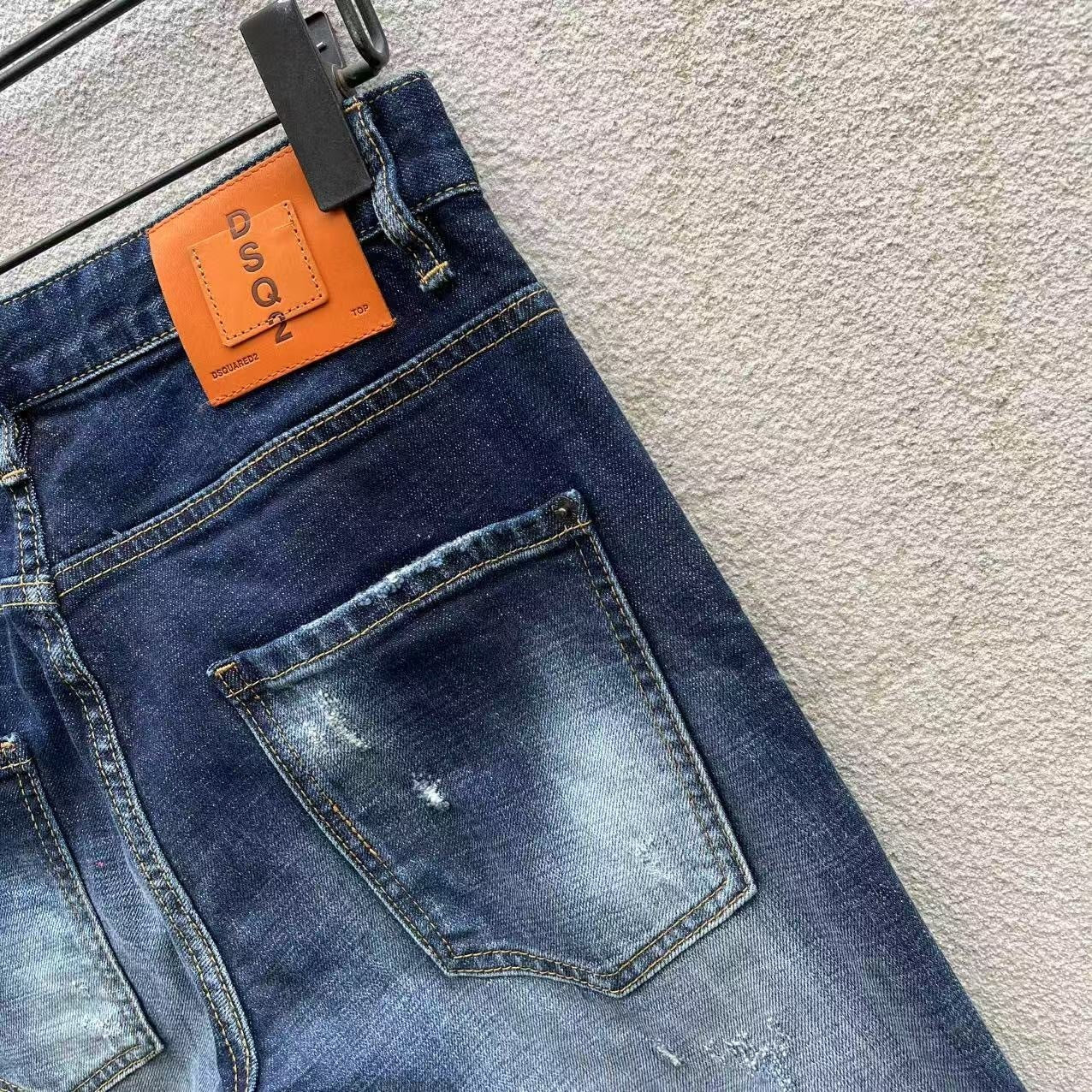 FADED DISTRESSED SLIM JEANS