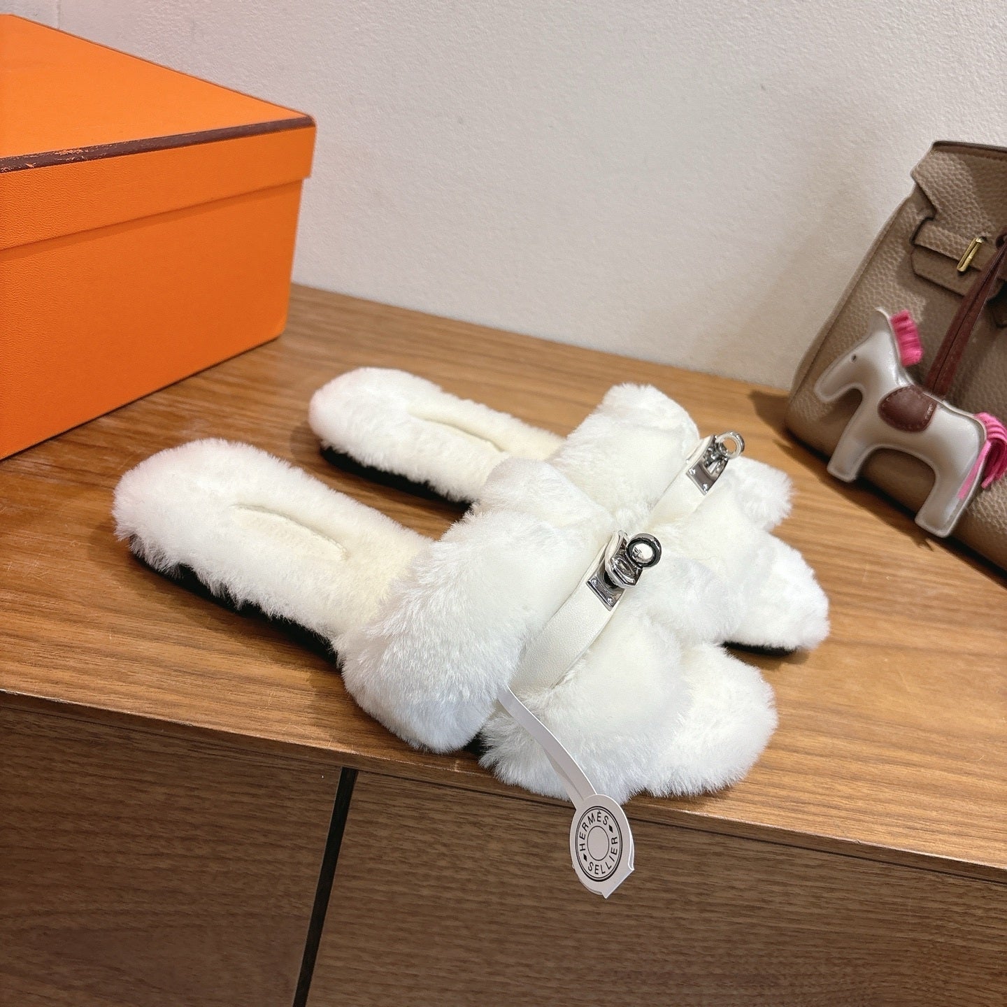 IVORY FAUX FUR MULE SLIPPERS WITH SILVER-TONE ACCENT