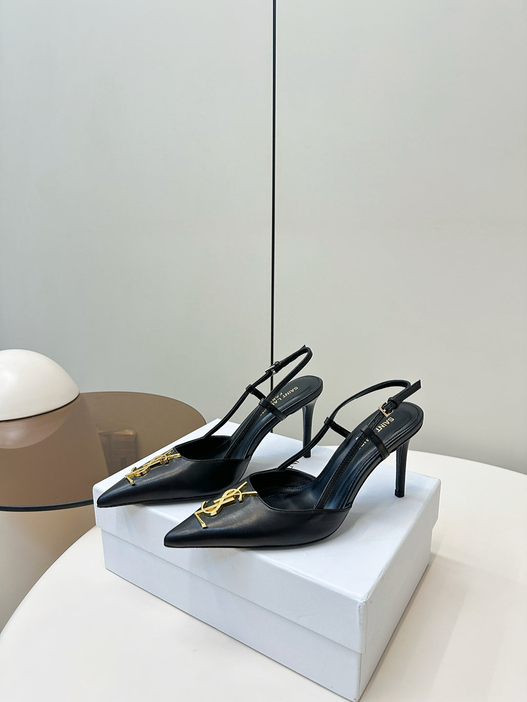BLACK POINTED TOE SLINGBACK HEELS WITH GOLD DETAIL